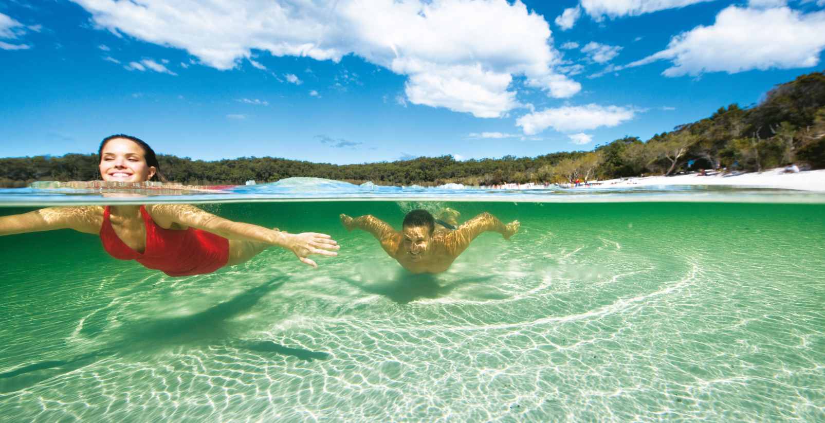 two people swimming in lake on Fraser Island