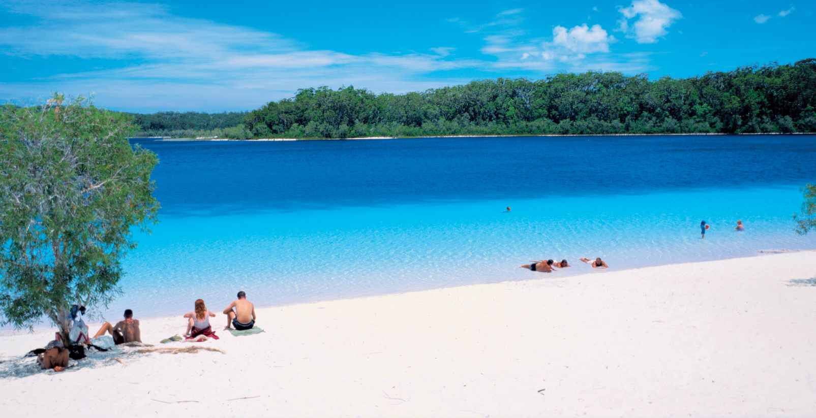 people swimming in lake on Fraser Island